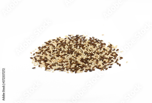 sesame and Organic Linseed or Flaxseed (Linum usitatissimum) isolated on white background.