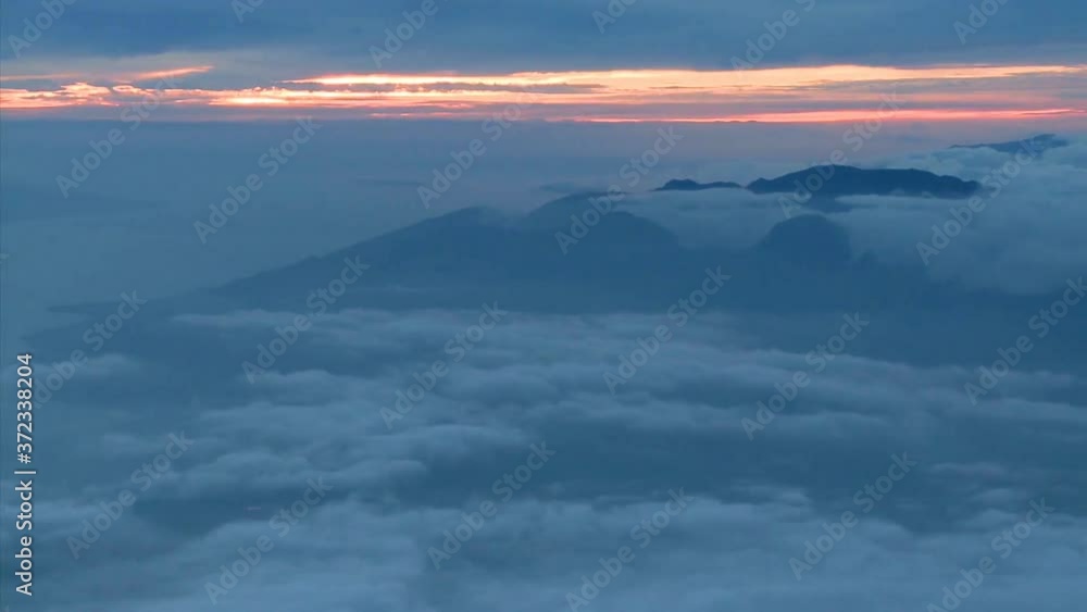 Sunset seen from above the clouds, time lapse Sunset seen from above the clouds, time lapse