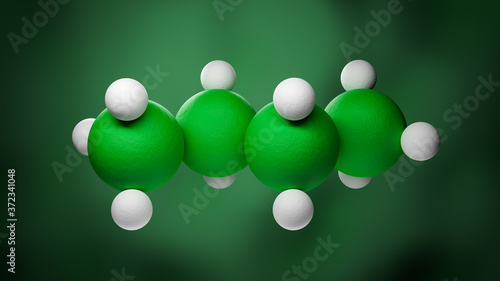 Model of a butane molecule of the family of the single bonded hydrocarbons. Four Carbon atoms in green, Hydrogen atoms in white. photo