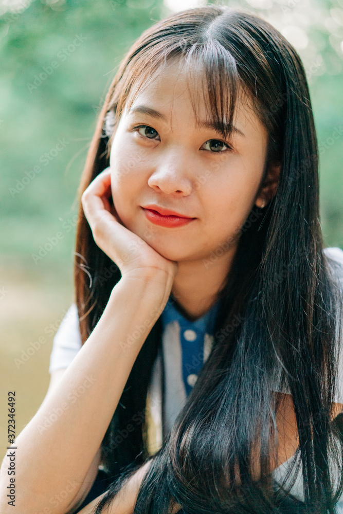 portrait of asian collage student outdoor portrait of asian collage student outdoor