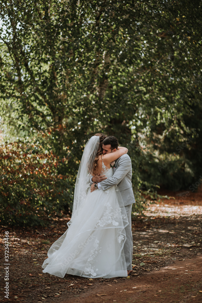Bride and Groom in Big Hug at Wedding Bride and Groom in Big Hug at Wedding