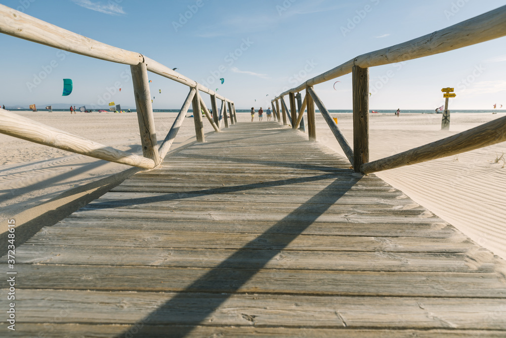 A boardwalk path leading to the beach A boardwalk path leading to the beach
