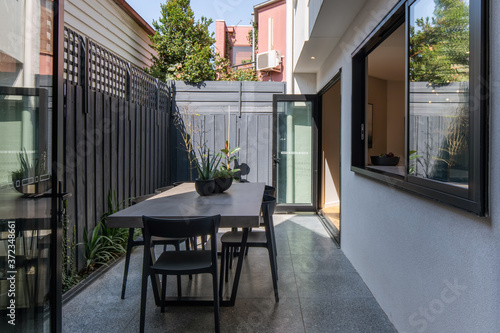 Small outdoor terrace in modern inner city home photo