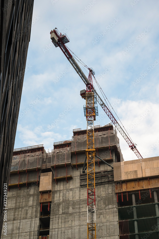 Crane in a construction site Crane in a construction site