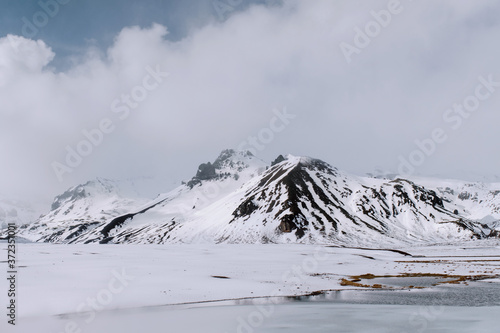 View of the snow covered mountains photo