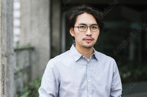 Portrait of businessman smiling and looking at camera photo