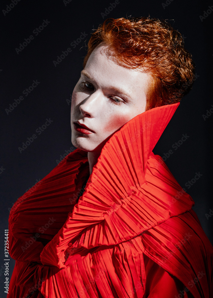 Transgender man in red garment Transgender man in red garment