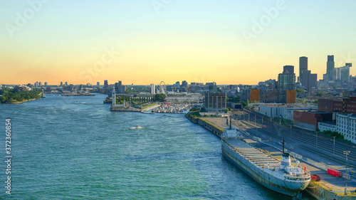 Quadro em tela View of old port area with large ship, middel of the summer, Montreal, Canada