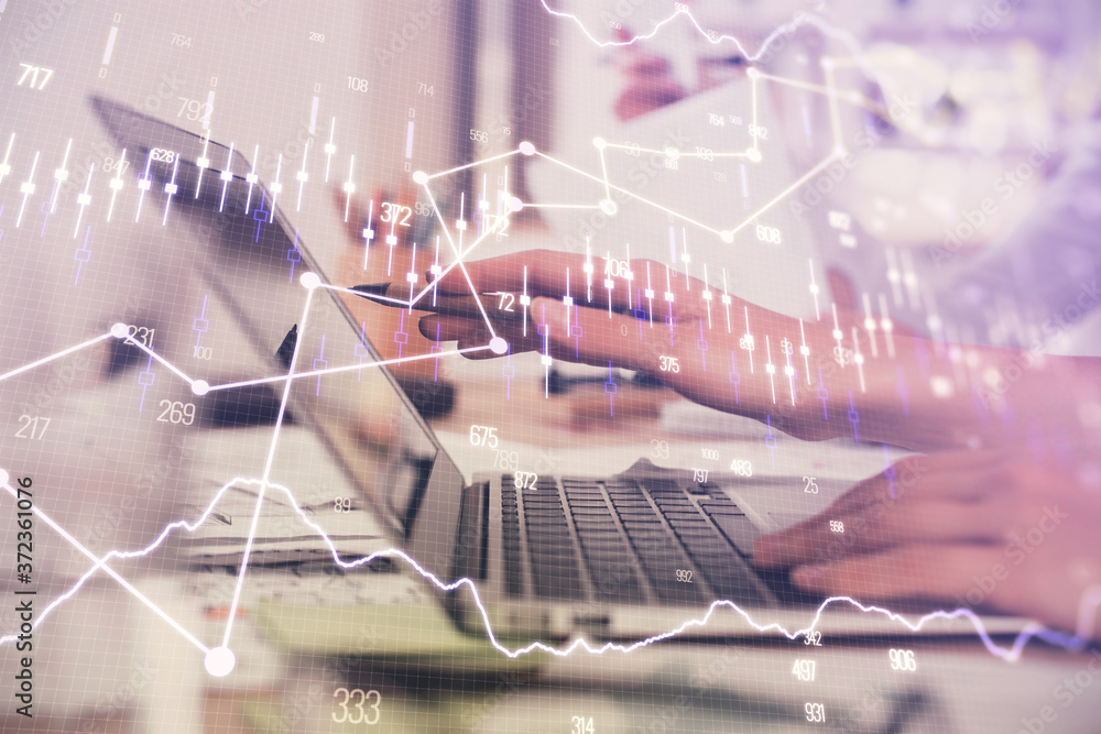 Multi exposure of woman hands typing on computer and financial graph hologram drawing. Stock market analysis concept. Multi exposure of woman hands typing on computer and financial graph hologram drawing. Stock market analysis concept.