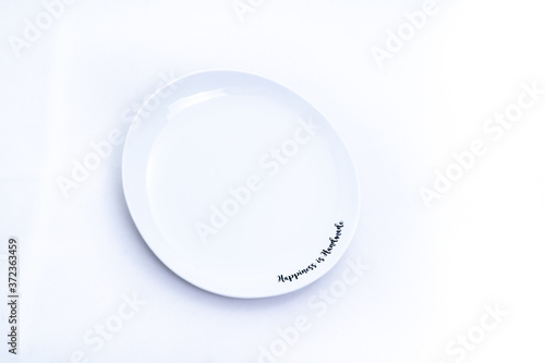 White plate with black wording isolated on white background