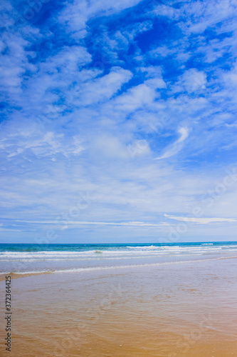 Summer beach background. Sand  sea and blue sky. ocean