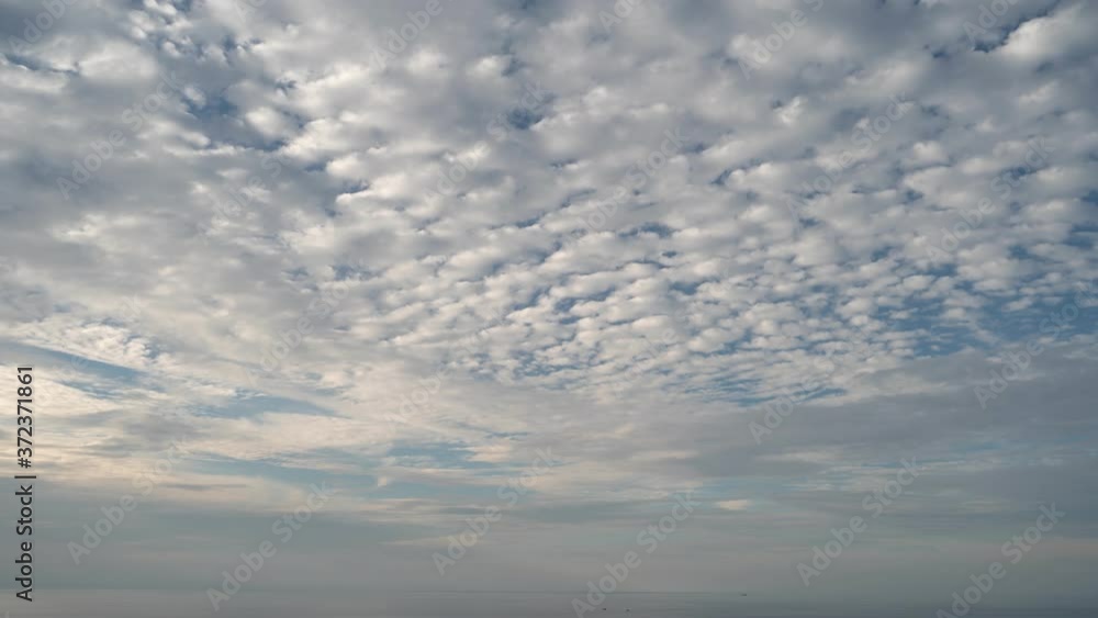 4K-time lapse of blue sky and clouds flowing in the sky summer season nature footage 4K-time lapse of blue sky and clouds flowing in the sky summer season nature footage