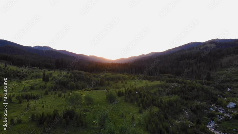 Aerial shot of a beautiful green valley in the Grand Teton National Park. Aerial shot of a beautiful green valley in the Grand Teton National Park.