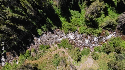 Aerial overhead shot of a small river in the miiddle of the Grand Teton National Park in Wyoming. photo