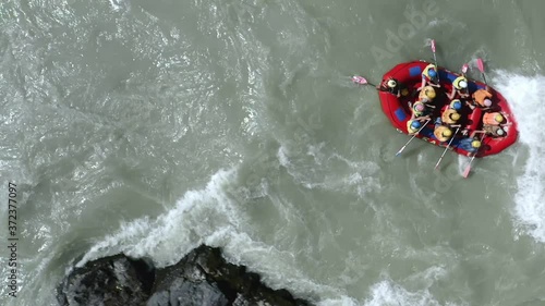 Gornoaltaisk, Altai, Russia - July 25, 2020: adventure team doing rafting on the cold waters of the Katun River in Altai. slow motion photo