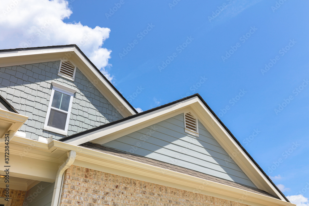 New traditional home rooftop with copy space New traditional home rooftop with copy space