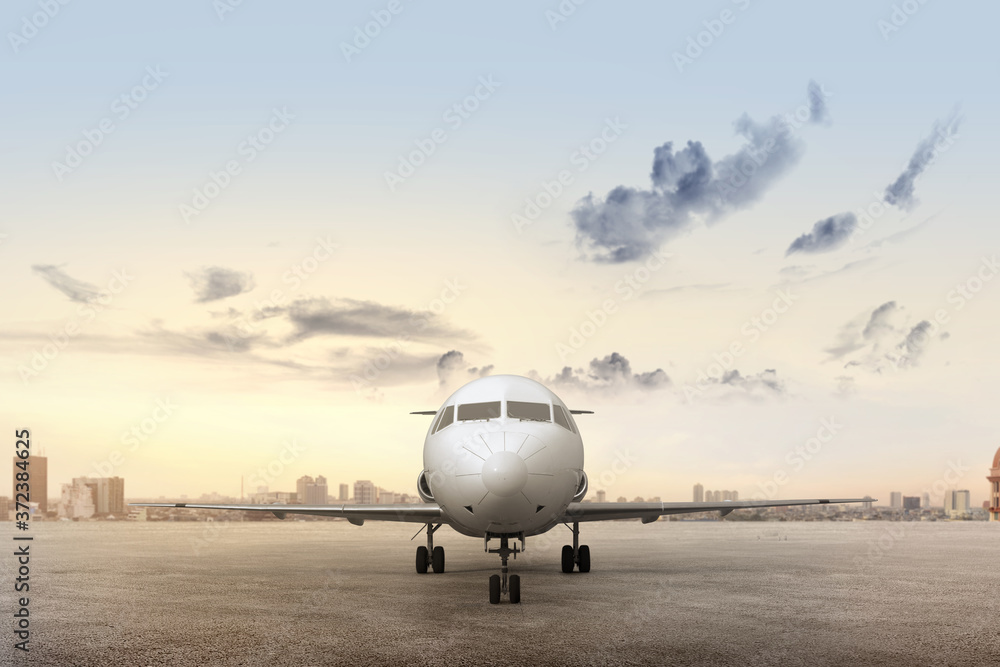 Airplane on the runway with cityscapes Airplane on the runway with cityscapes