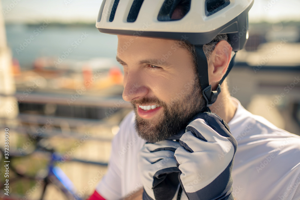 Close-up of mans head in bicycle helmet Close-up of mans head in bicycle helmet
