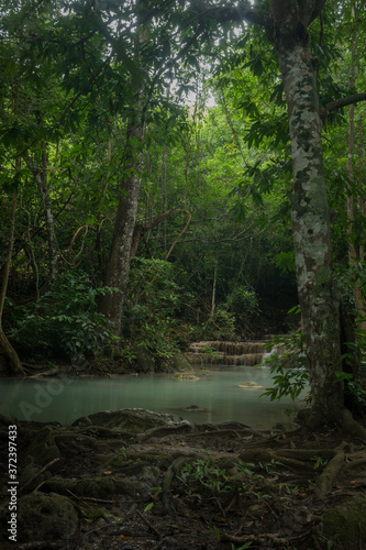 Fototapeta Naklejka Na Ścianę i Meble -  In the Thailand Jungles of Kanchanaburi is the Fairytale Realm know as Erawan