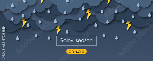 Storms and rainy weather in paper cut style with "on sale" yellow banner and "Rainy season" lettering on paper pattern background. Web banner and business poster in vector design.
