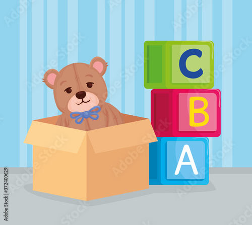 kids toys, alphabet cubes with teddy bear in box vector illustration design