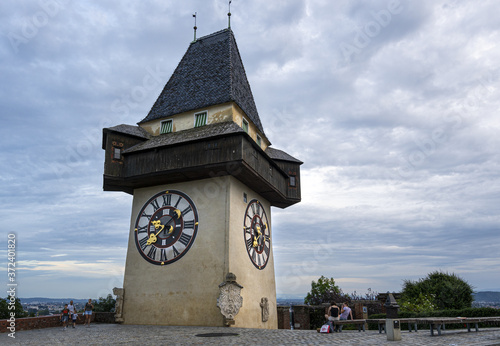 Clock tower at sunset in Graz