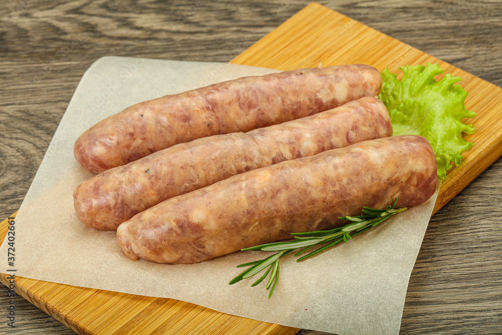 Raw pork meat sausages for grill Raw pork meat sausages for grill