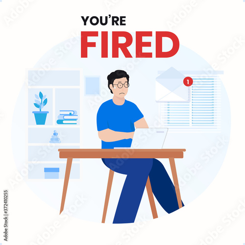 Sad expression from an employee after getting email notification that telling he is dismissal as employee from the office company startup technology. Sorry, you're fired during Covid-19. 