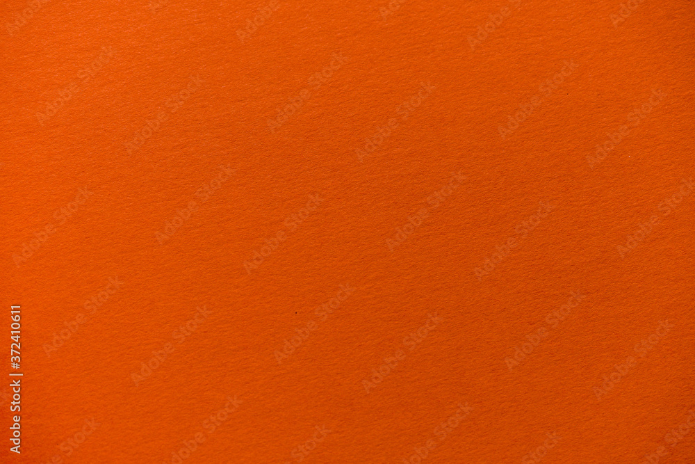 Orange paperboard surface texture background Orange paperboard surface texture background