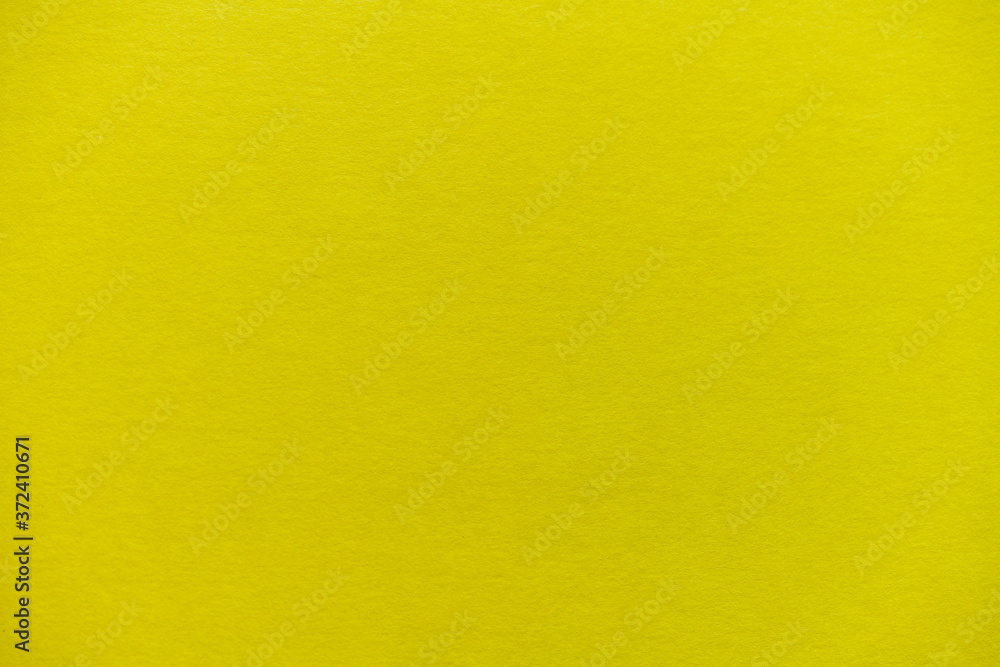 Yellow paperboard surface texture background Yellow paperboard surface texture background
