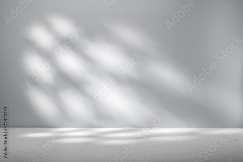 Leinwand Poster Gray background for product presentation with beautiful light pattern