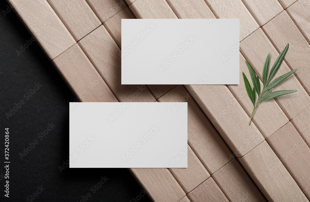 Minimal business card mockup on wooden block Minimal business card mockup on wooden block