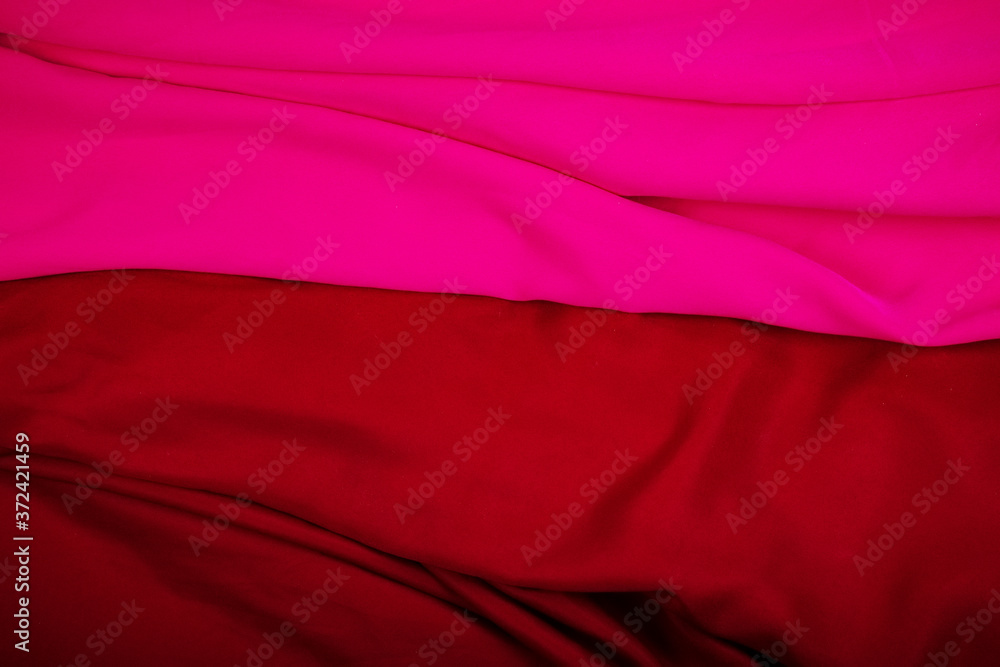 Closeup folds of pink and red or drapery (with copyspace for text) Closeup folds of pink and red or drapery (with copyspace for text)