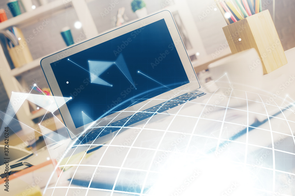 Double exposure of desktop with computer and world map hologram. International data network concept. Double exposure of desktop with computer and world map hologram. International data network concept.