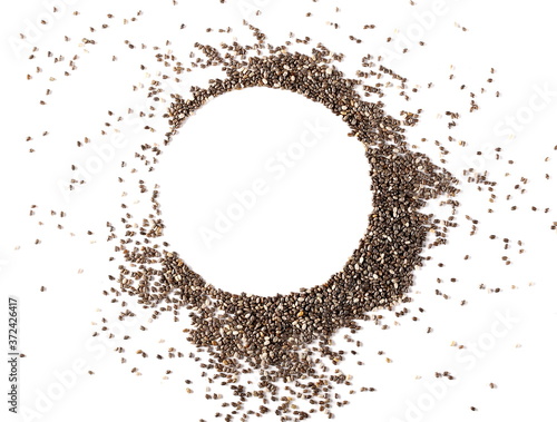 Chia seeds pile, round frame and border isolated on white background, top view