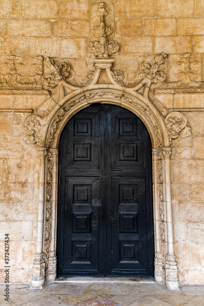 Metal Entrance in the Cloister of the Jeronimos Monastery Cathedral in Lisbon, horizontal