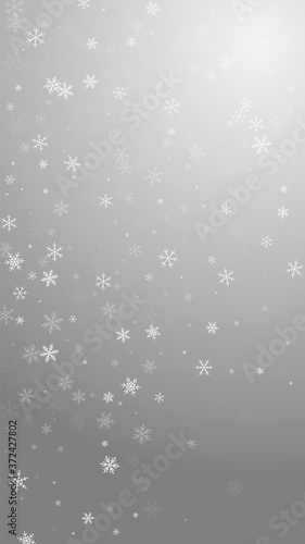 Sparse snowfall Christmas background. Subtle flyin