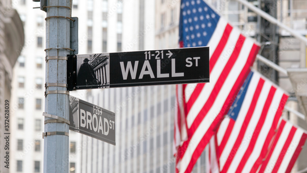 Wall Street sign in lower Manhattan New York - obrazy, fototapety, plakaty 