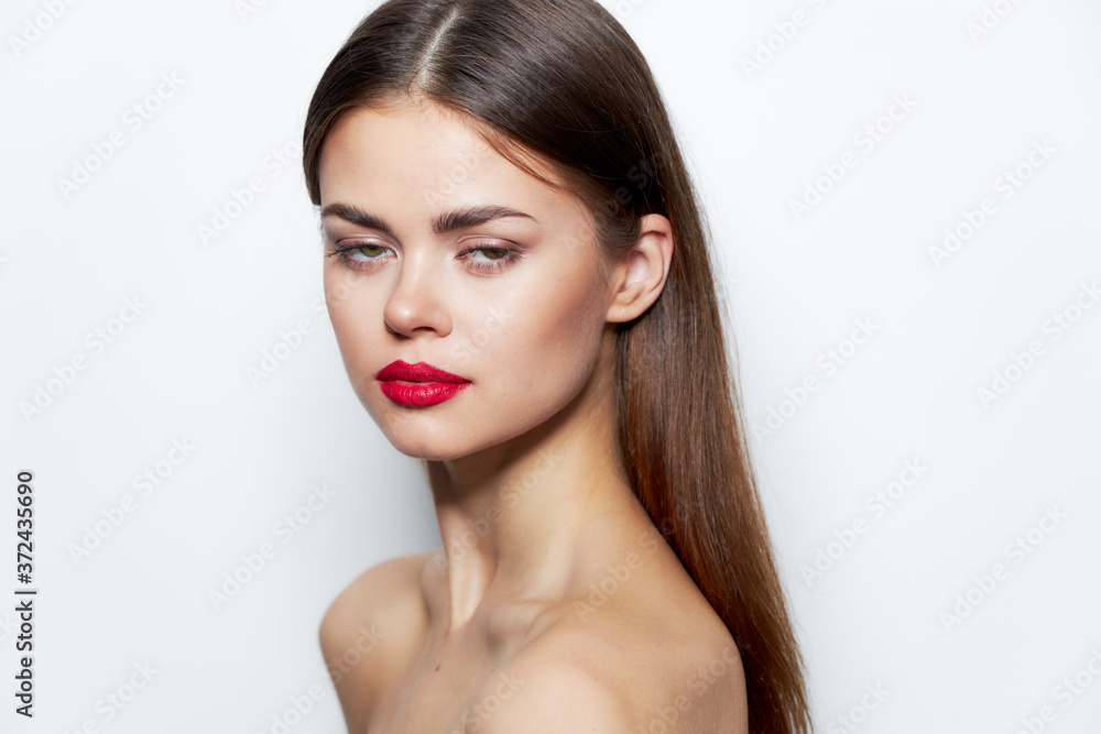 Charming woman bare shoulders Red lips clear skin charm Charming woman bare shoulders Red lips clear skin charm