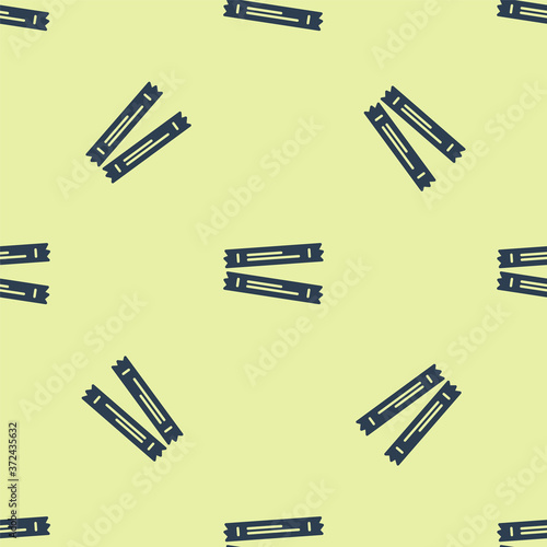 Blue Sugar stick packets icon isolated seamless pattern on yellow background. Blank individual package for bulk food products as coffee, salt, spices. Vector.