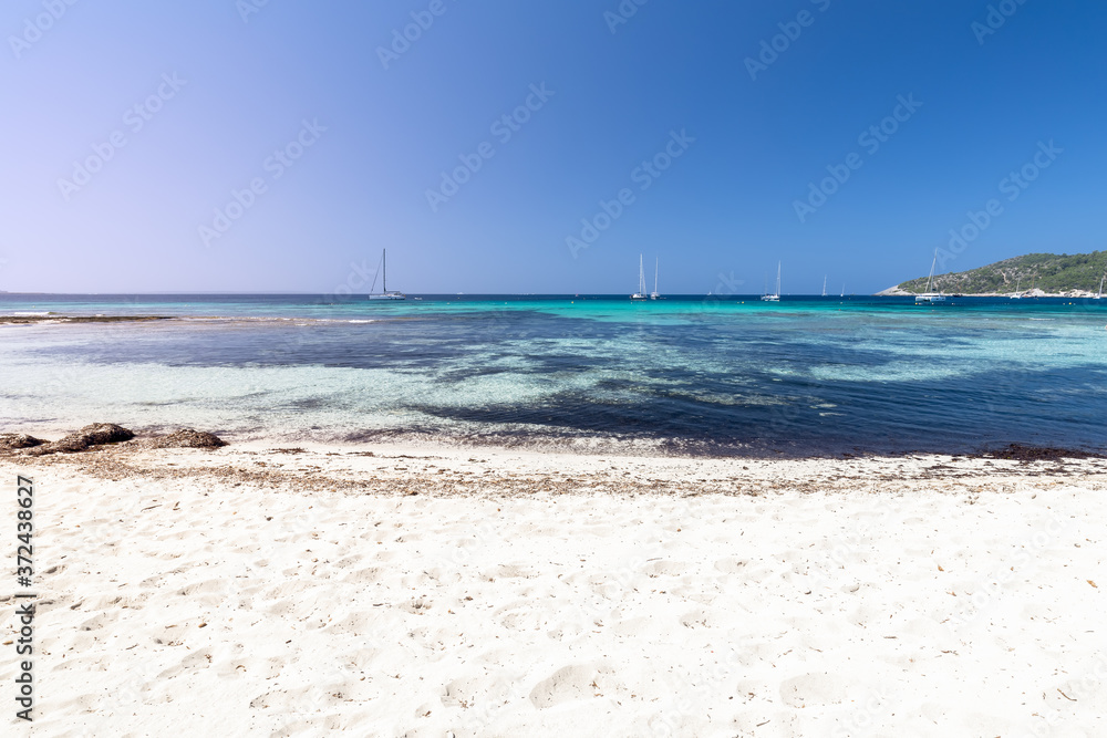 Finest white sand on one of the most beautiful beaches Ses Salines in Ibiza island