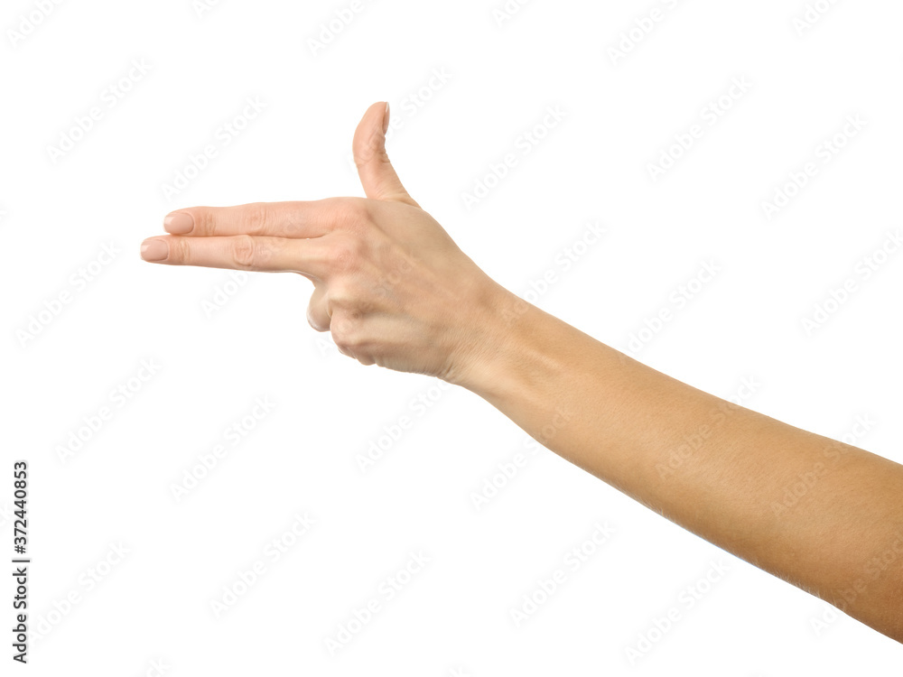 Shooting gun. Woman hand gesturing isolated on white Shooting gun. Woman hand gesturing isolated on white