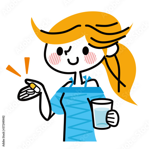 薬を飲む女性