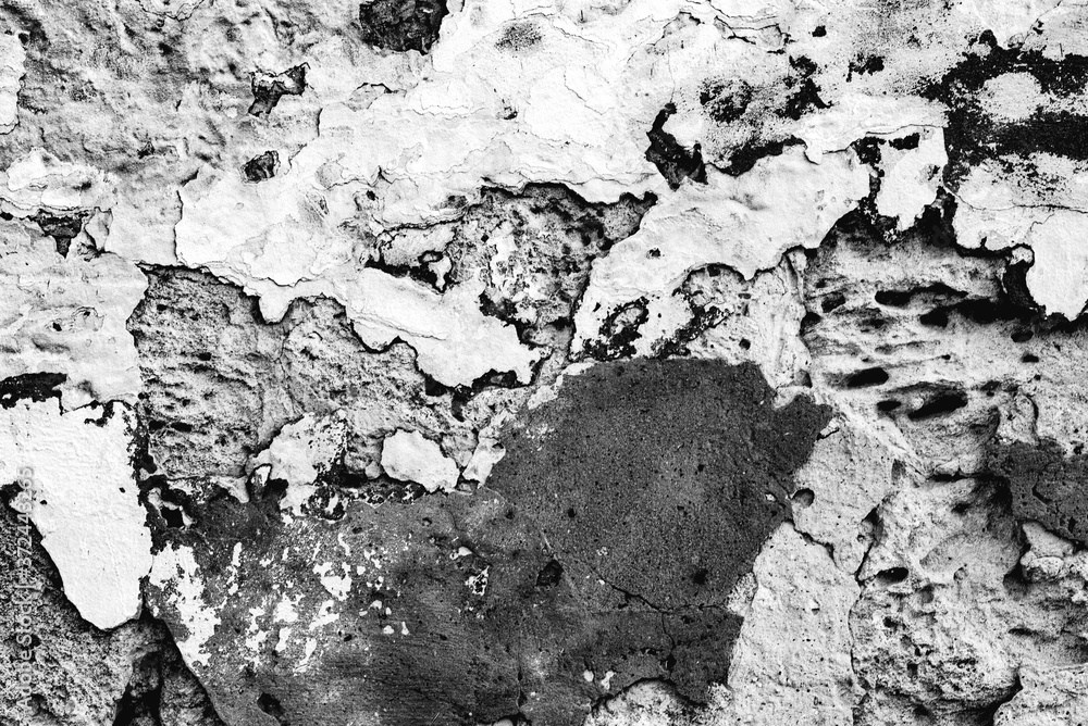 Texture of a concrete wall with cracks and scratches Texture of a concrete wall with cracks and scratches