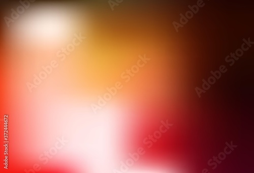 Dark Red, Yellow vector blurred shine abstract template.