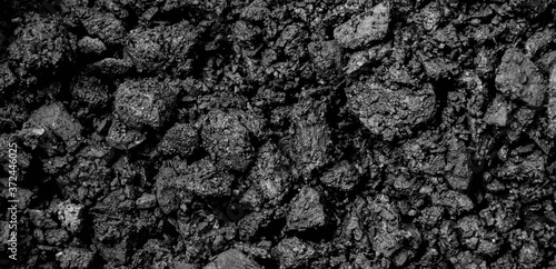 Coal Mine. Natural black coals for background. Industrial coals. Volcanic rock energy on earth. Stone Natural Energy Source.