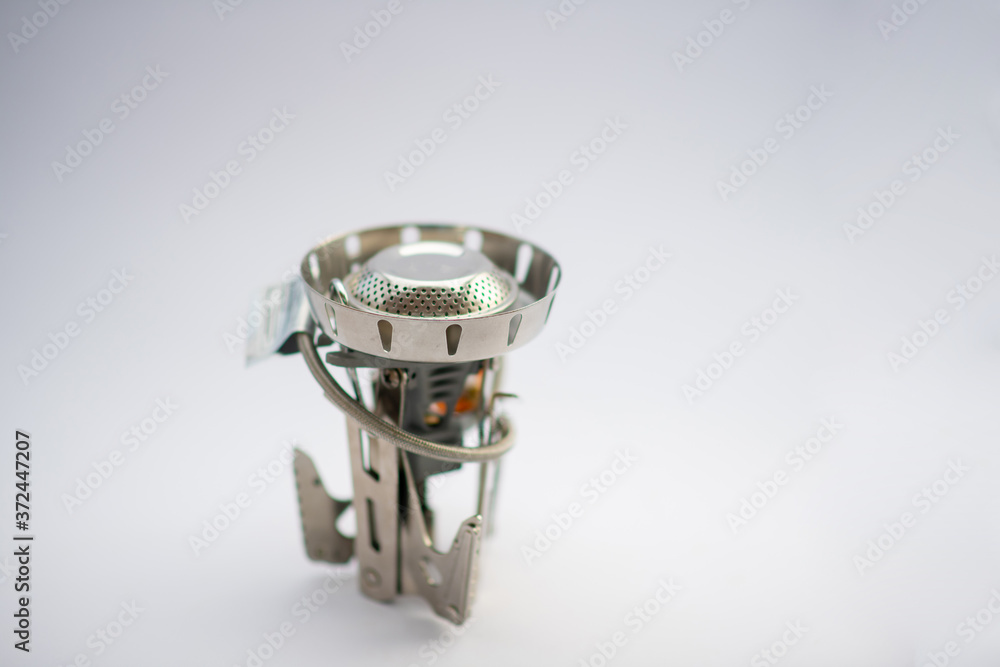 portable gas stove for cooking. Hiking, camping equipment. bushcraft and survival concept portable gas stove for cooking. Hiking, camping equipment. bushcraft and survival concept