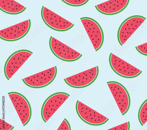 Cute watermelon pattern on blue background. Vector pattern with watermelon slices. 