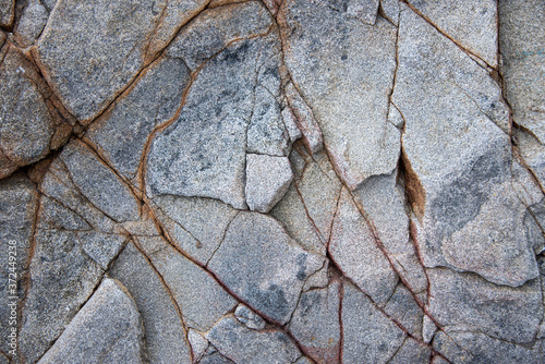 Rock texture and surface background. Cracked natural stone background