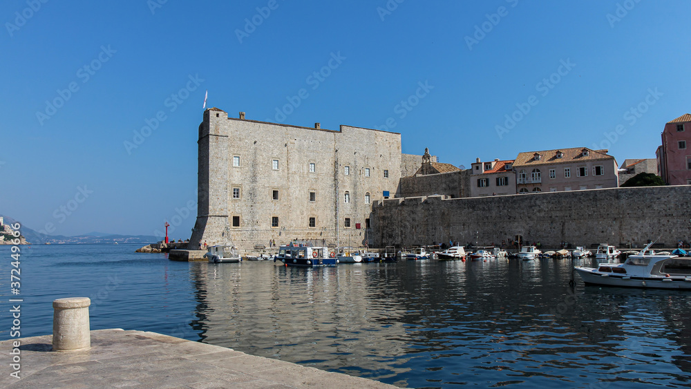 Dubrovnik harbour by the maritime museum and city walls, Croatia